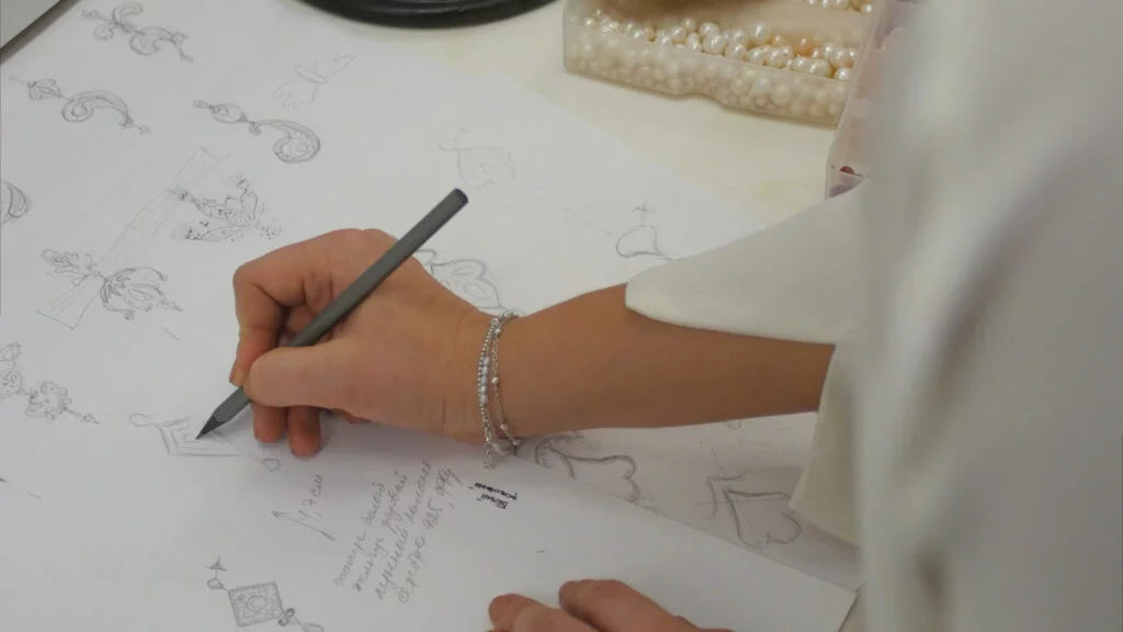 Gem designer sketching some ideas
