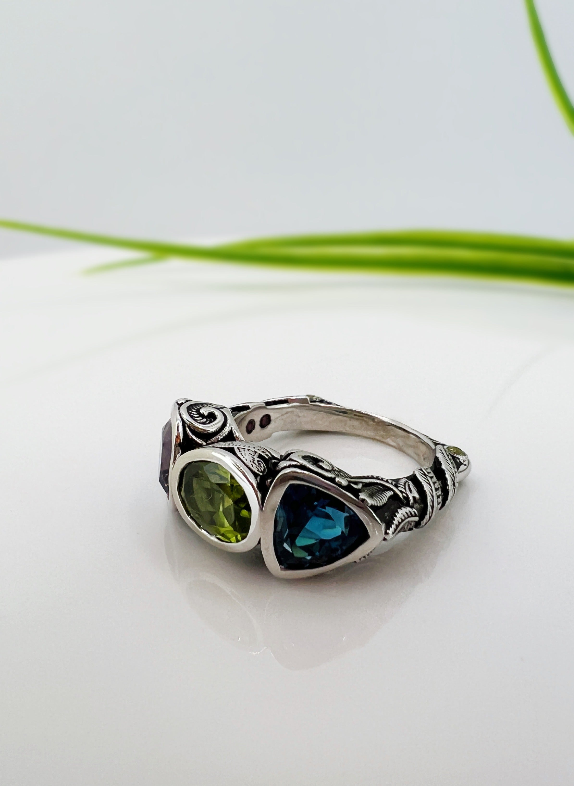 custom ring in topaz, peridot, and amethyst