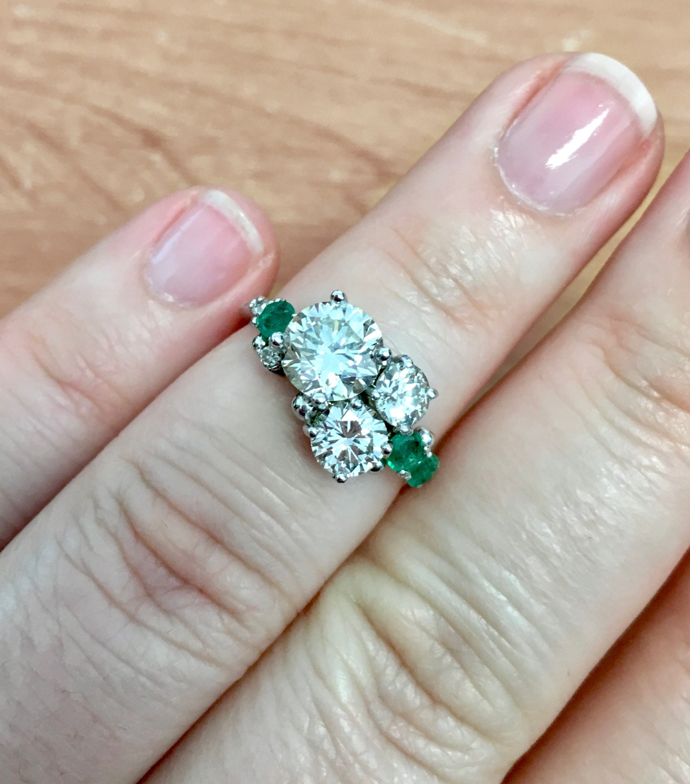 custom heirloom redesign diamond and emerald ring
