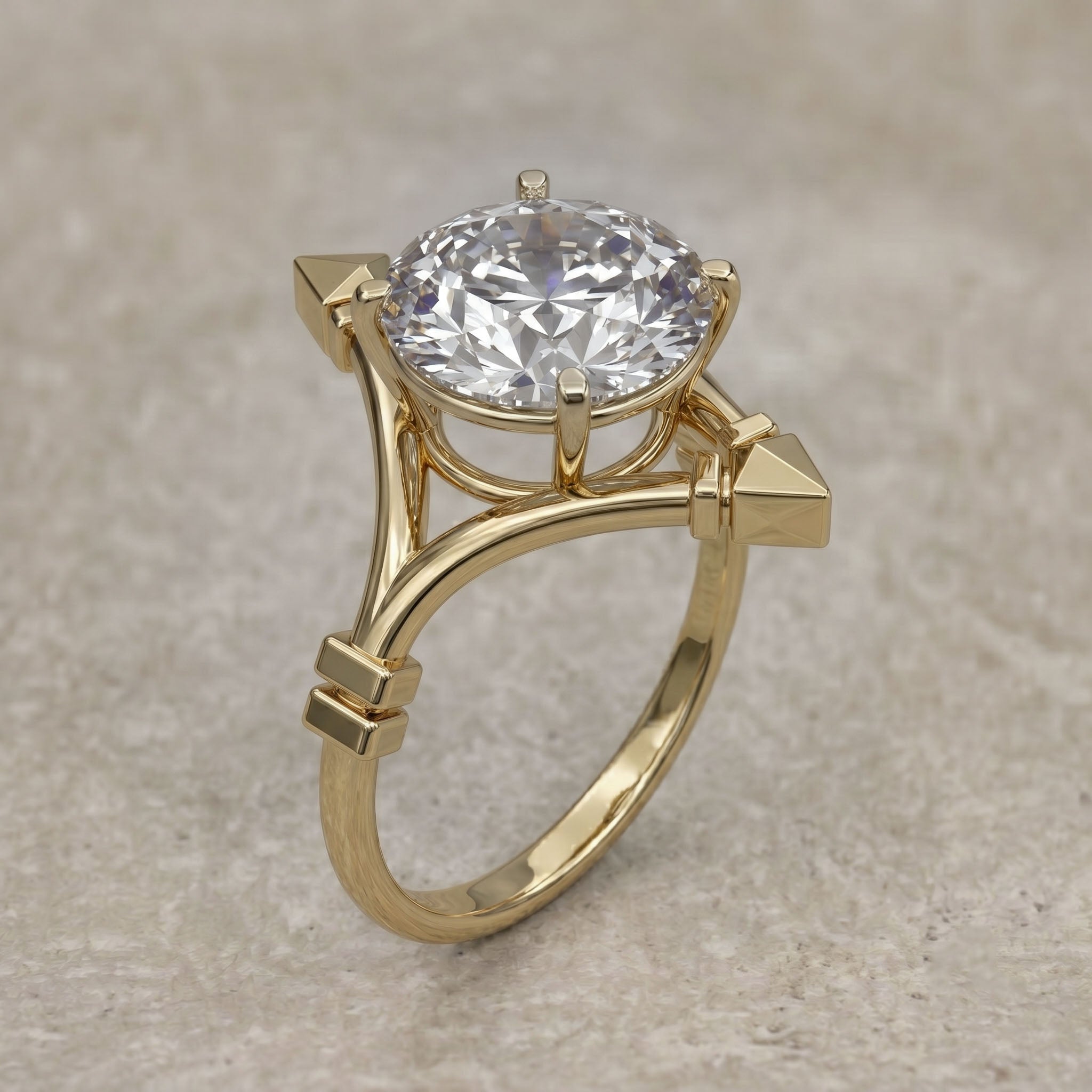 Gold ring with a large diamond on a beige background